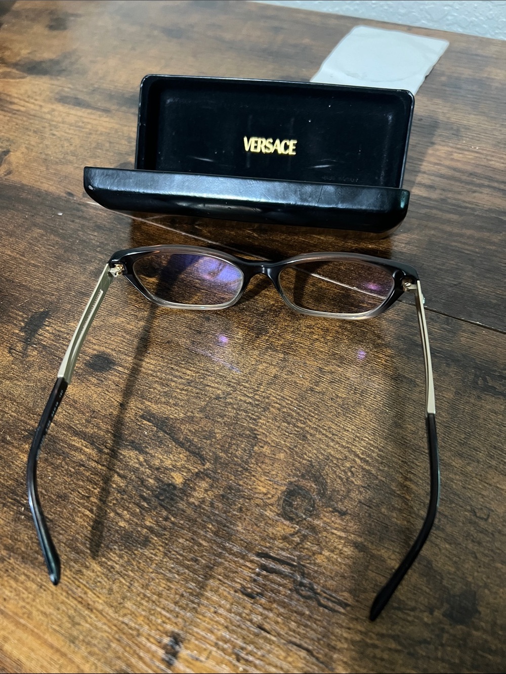 Versace Black Frame Sunglasses with Gold Temples